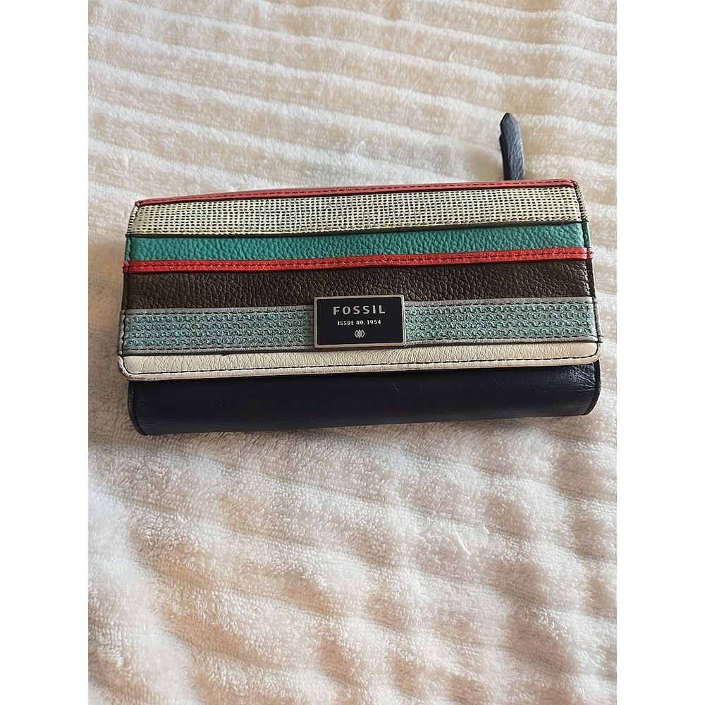 Fossil navy and‎ multicolored embroidered wallet with a striped design.